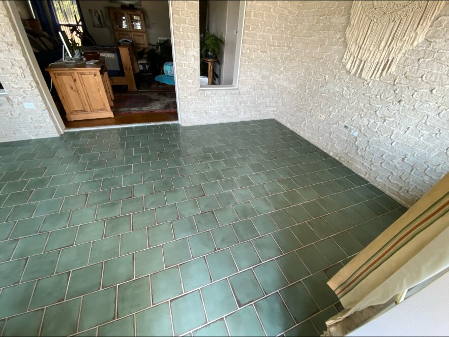 Finished green tile floor seen from a different perspective
